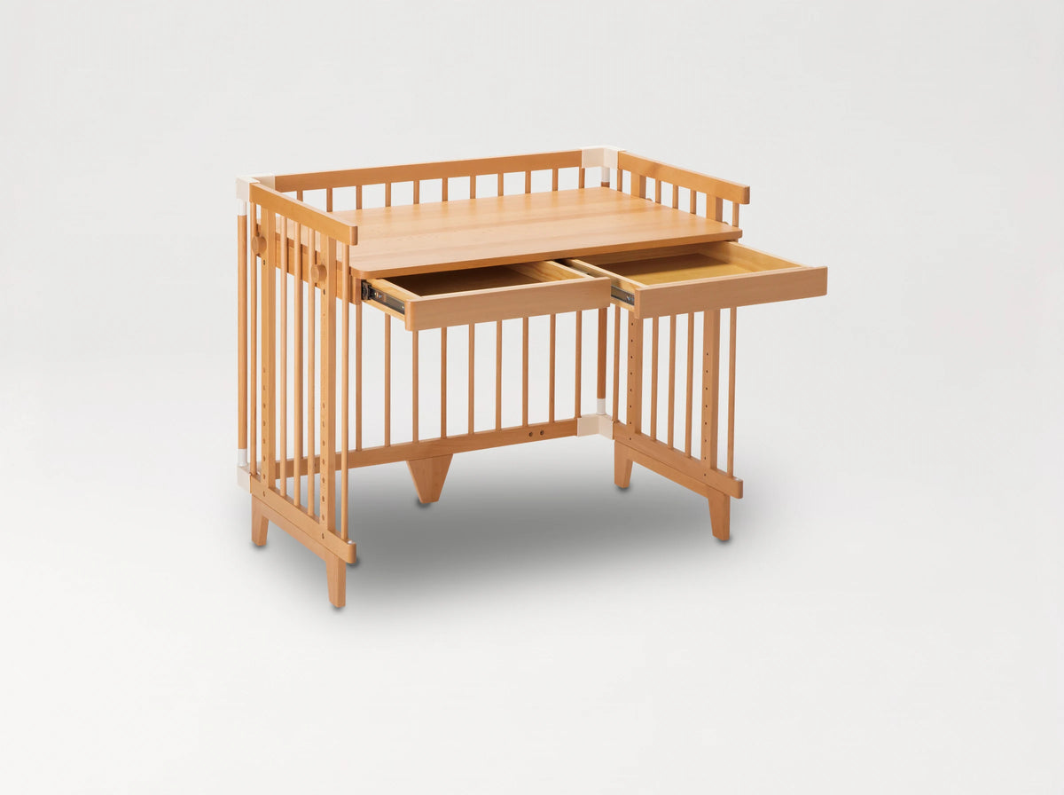 Creative Cot converted into a desk with two pull-out drawers