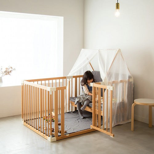Creative Cot in playpen mode with the Canopy forming a den