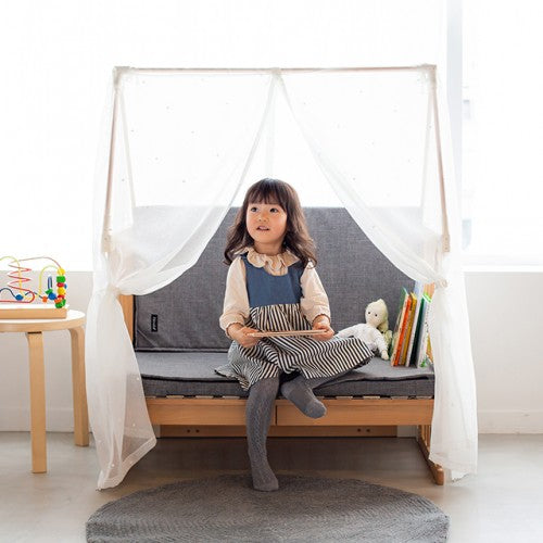 Creative Cot as a kids bench with the Canopy draped open