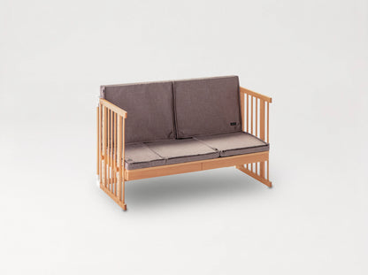 Creative Cot Long converted into a kids' sofa with seat and back cushions in Melange Brown