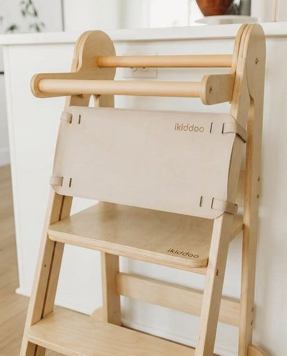 Handrail and branded back support of the ikiddoo learning tower