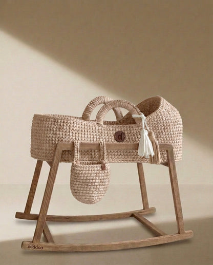 Pearl handwoven Moses basket on the wooden rocking stand