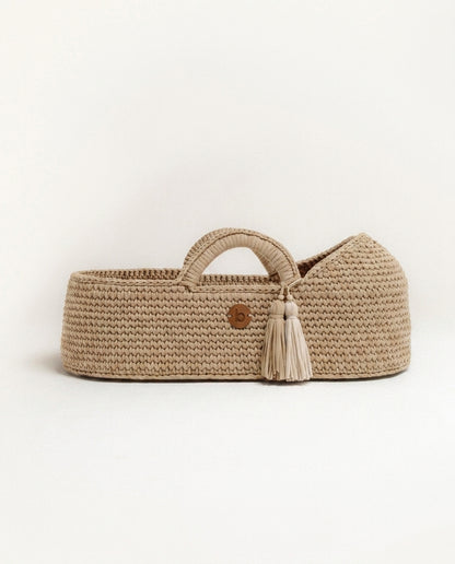 Handwoven Moses basket shown on a clean studio background