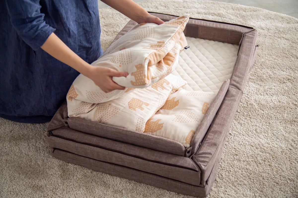 Step 1: fold the blanket and pillow inside