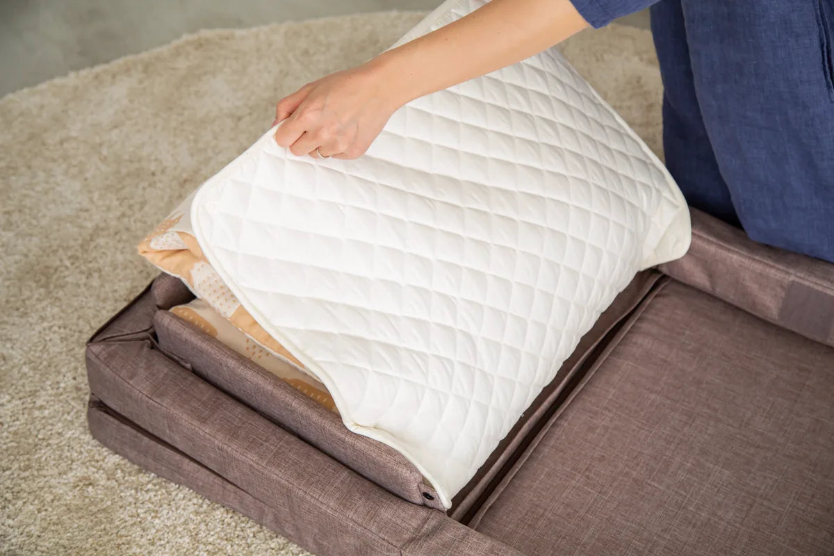 Step 2: lay the mattress pad on top