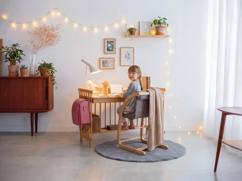 A schoolgirl at the Creative Cot study desk