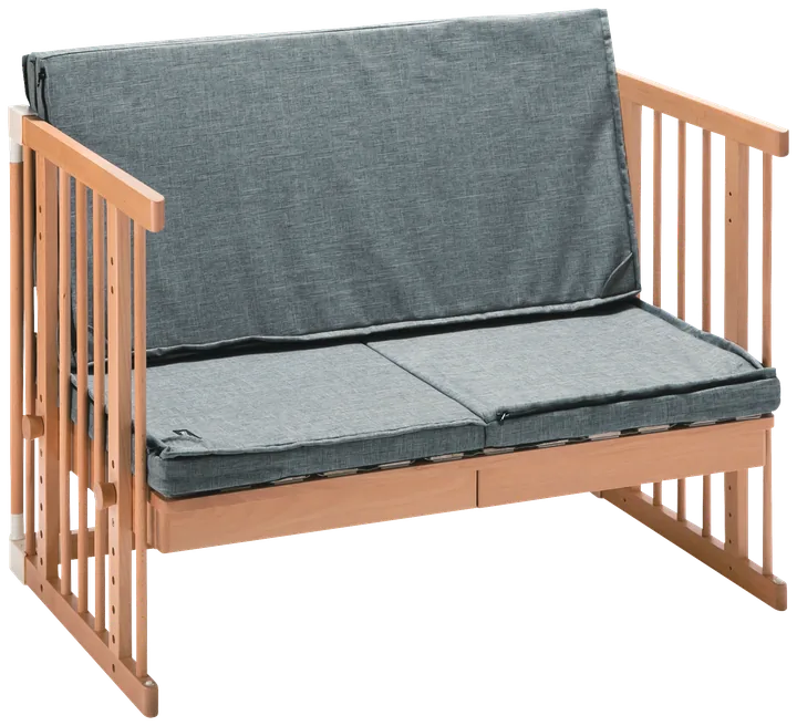 The Creative Cot in kids' sofa mode with Joint Mattress cushions