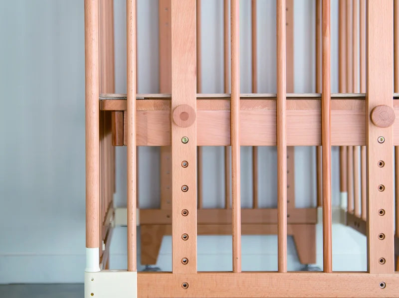 Solid beech up close - a detail of the Creative Cot Long frame