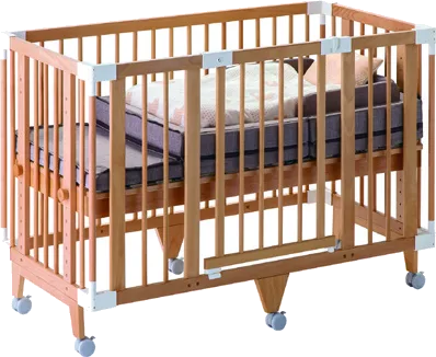 The Creative Cot Long in co-sleeping cot mode with the Compact Bed Free mattress